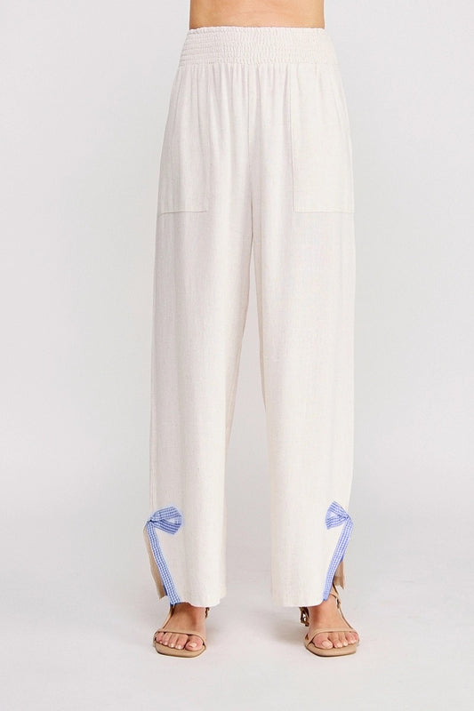 White pants with blue accents on a white background