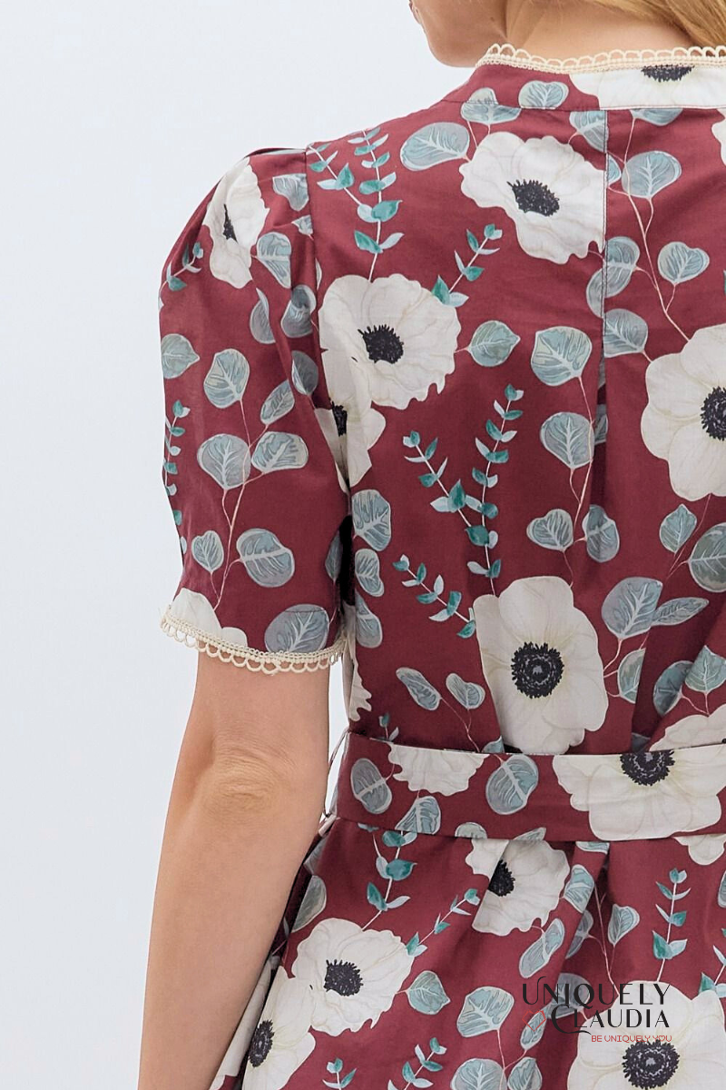 Close-up of a floral dress with a white background