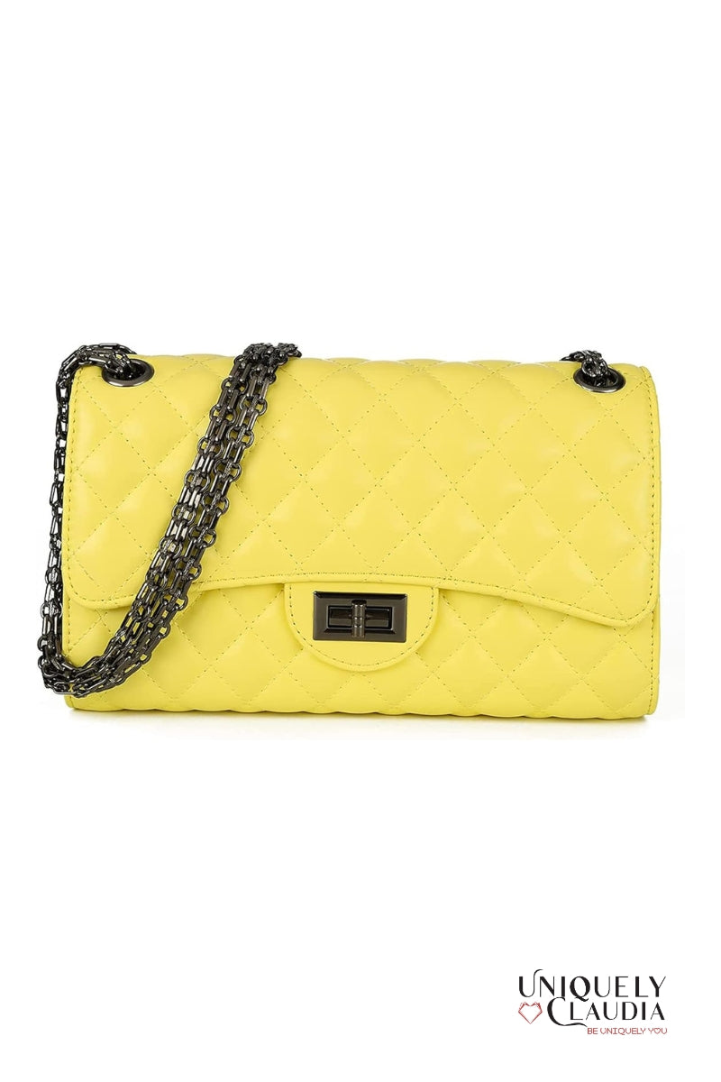 Yellow quilted handbag with a chain strap on a white background, branded 'Uniquely Claudia'.