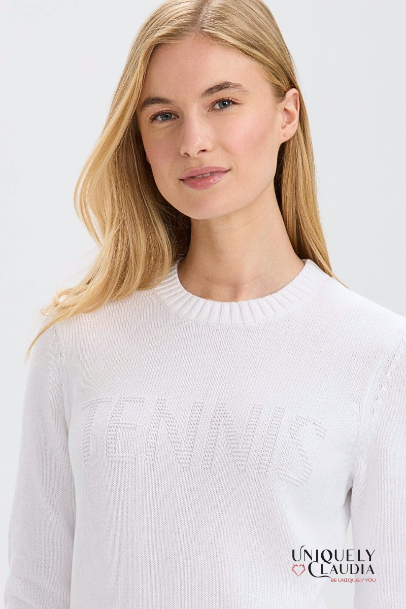 Woman wearing a white sweater