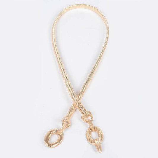 Gold necklace with shell-shaped clasps on a white background