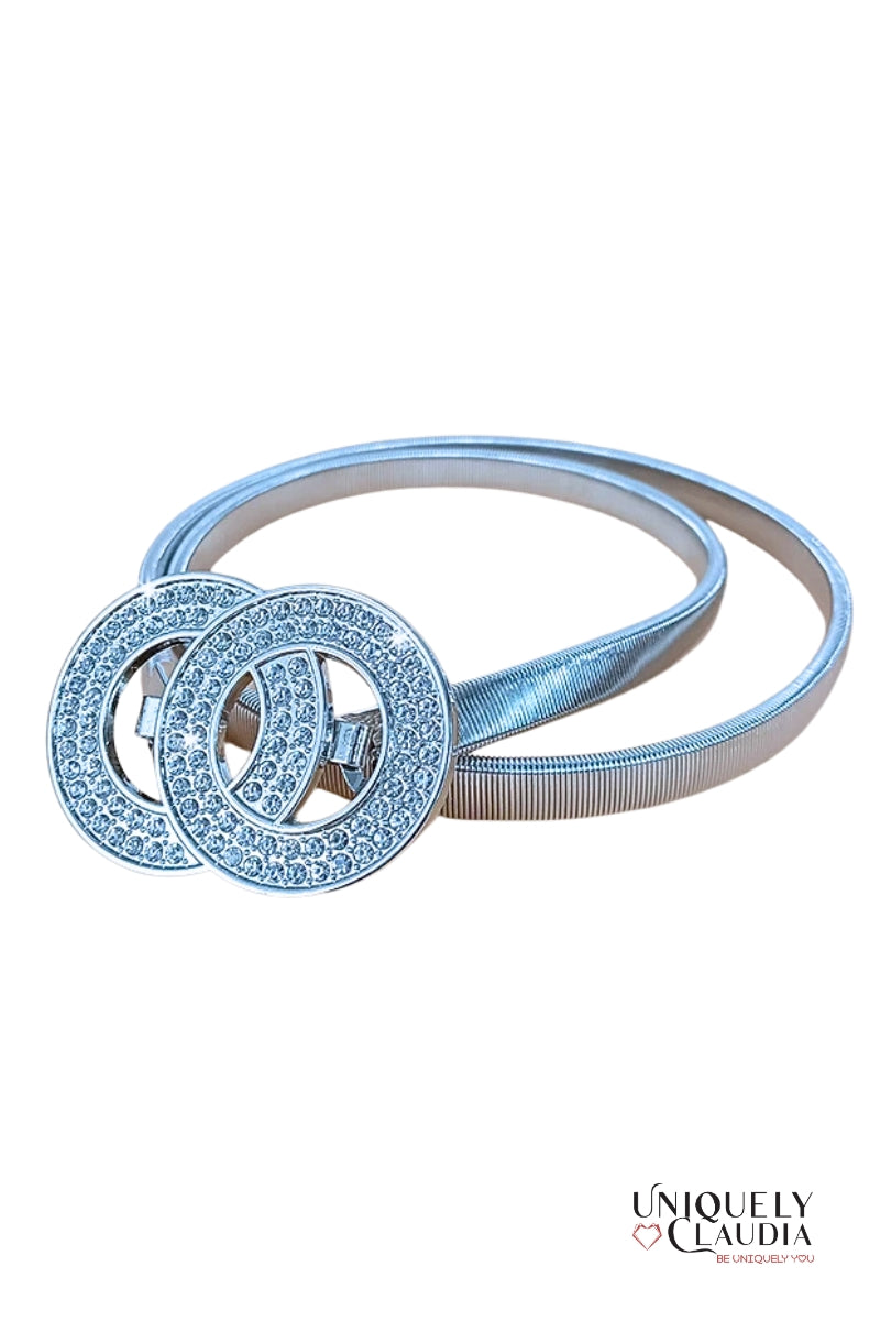 Silver belt with interlocking circular design on a white background