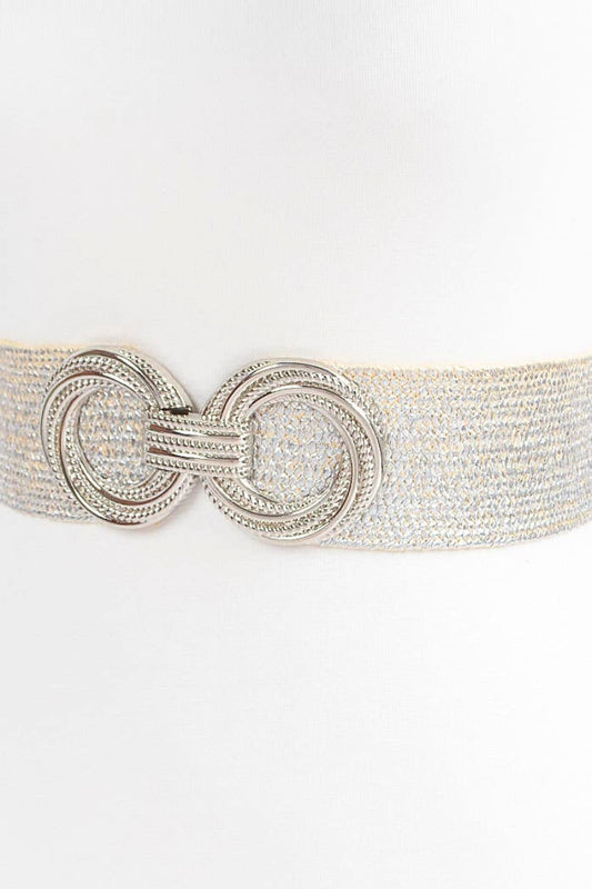 Wide belt with a decorative silver buckle on a white background