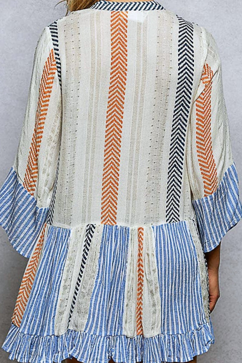 Multicolored patterned dress with a gray background