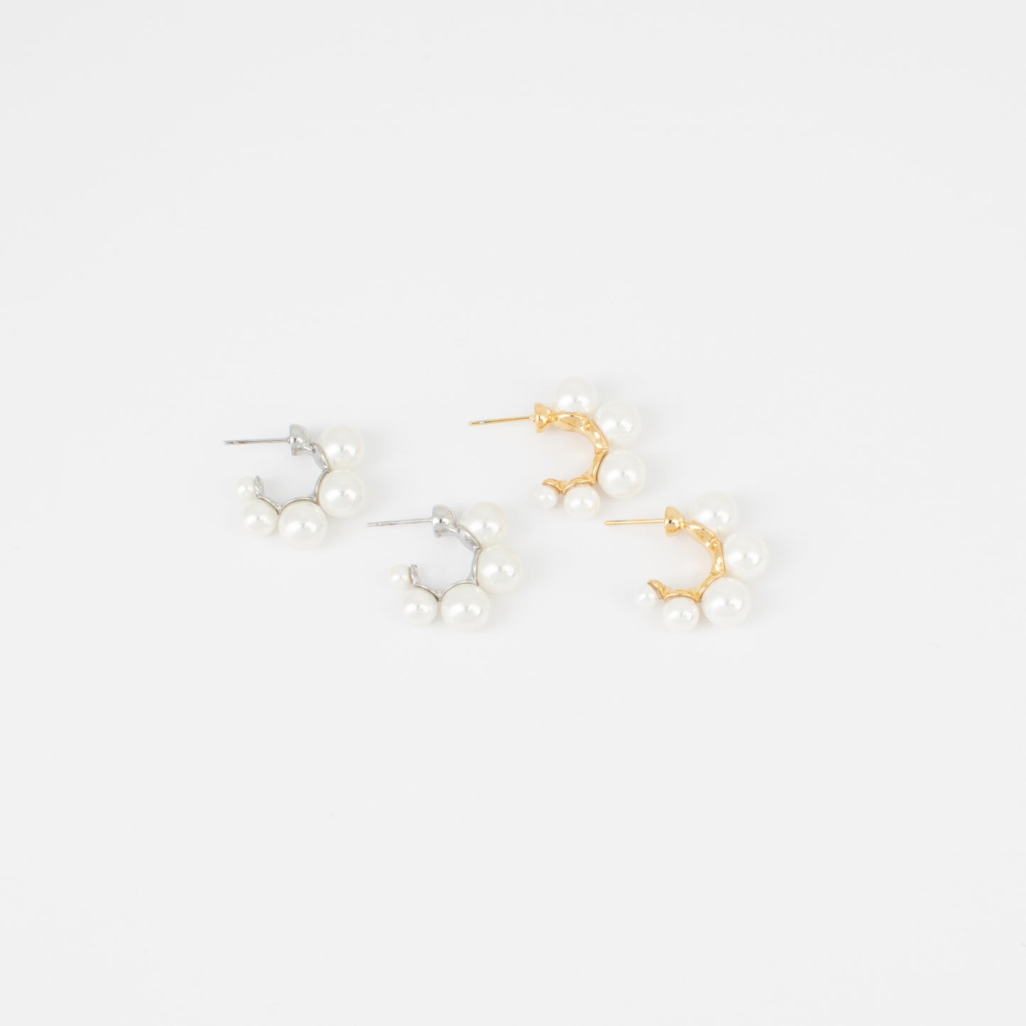 Pair of pearl earrings on a white background