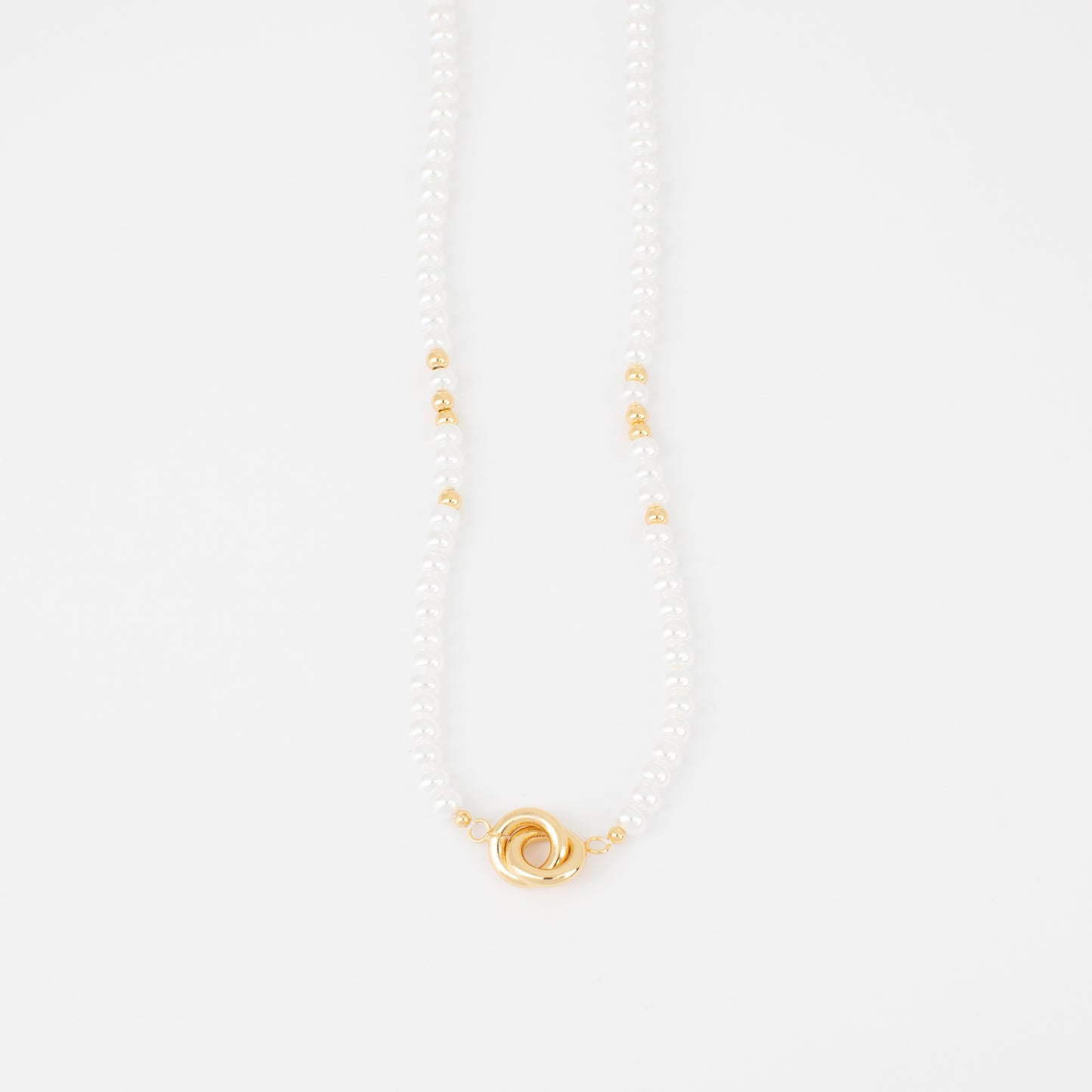 Pearl necklace with a gold clasp on a white background