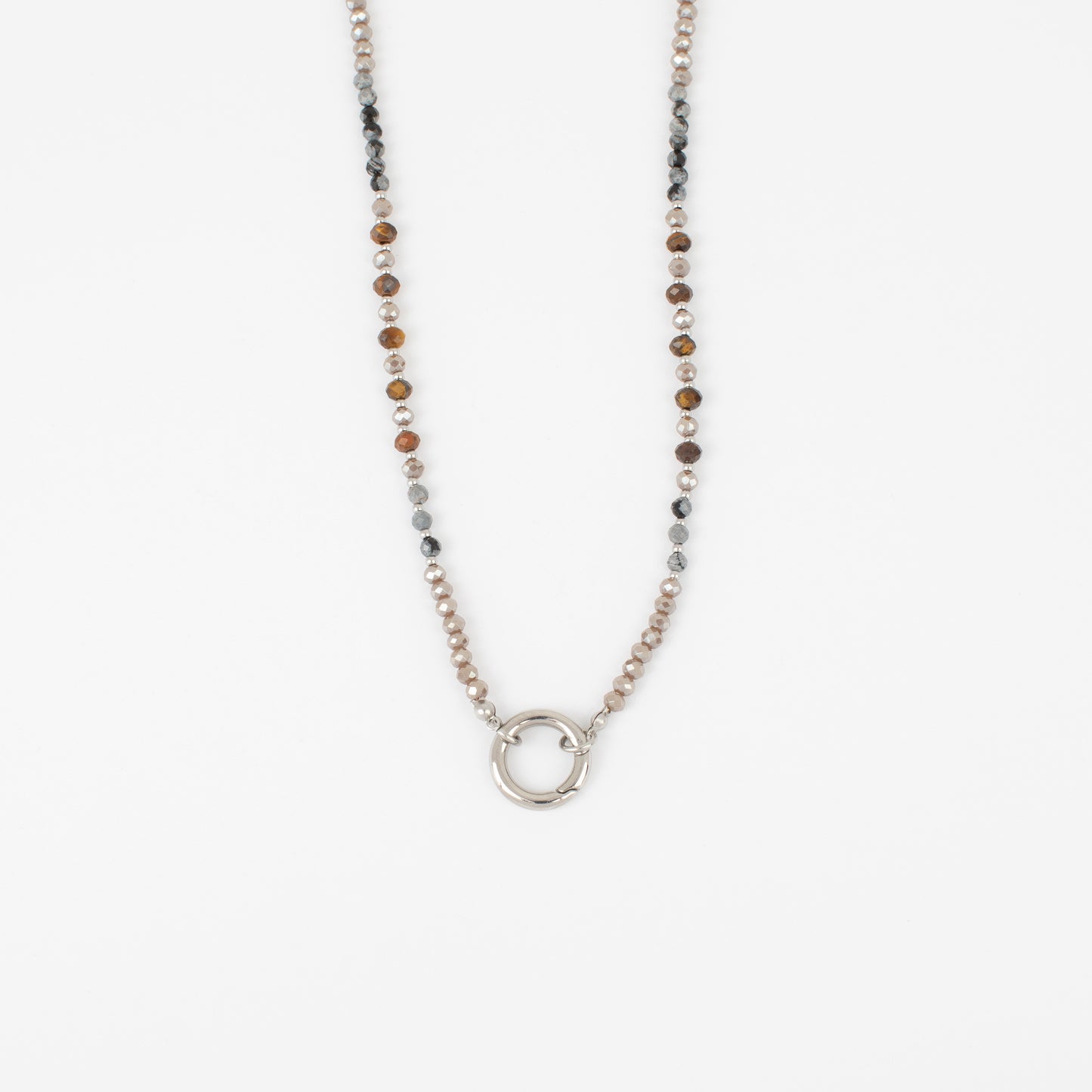 Necklace with small beads and a circular pendant on a white background