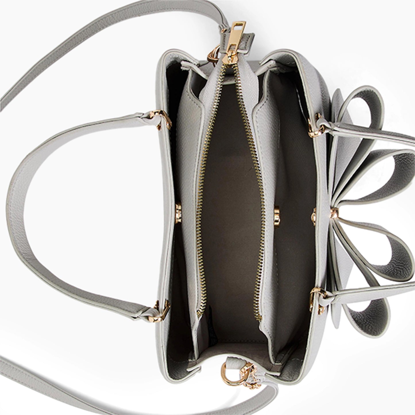 Silver handbag with floral design on a white background