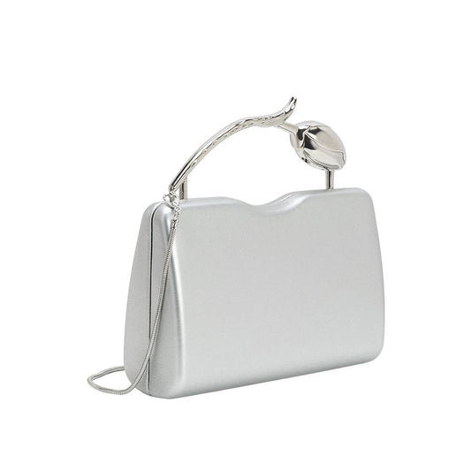 Silver clutch bag with unique handle design on a white background
