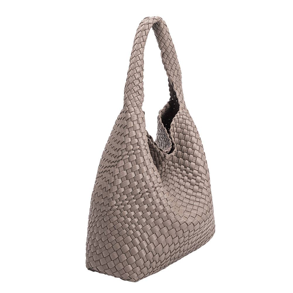 Woven handbag on a white background