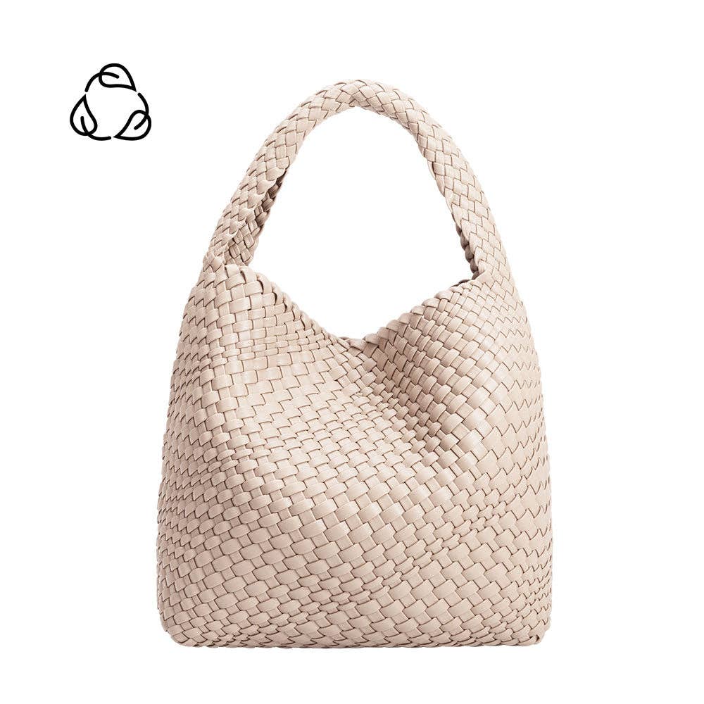 Beige woven handbag on a white background