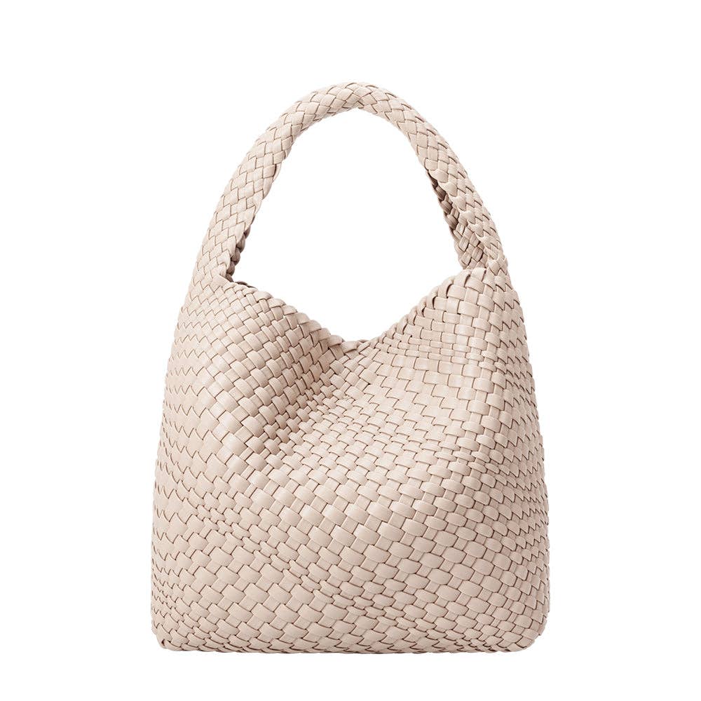 Beige woven handbag on a white background