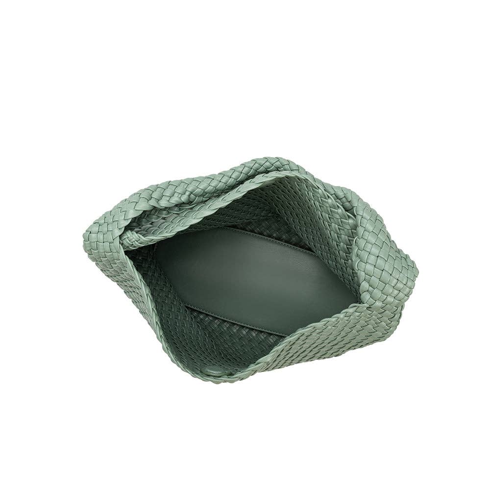 Green woven basket on a white background