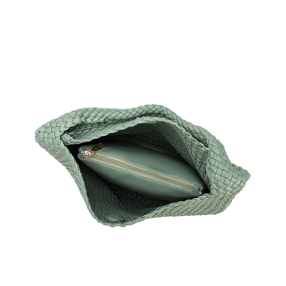 Green woven pouch with a smaller green pouch inside on a white background