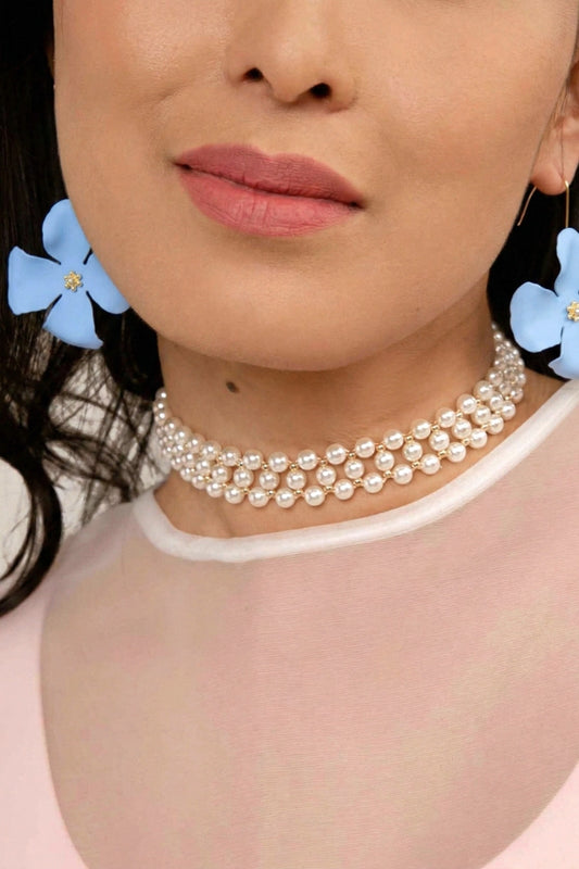 Blue flower-shaped earrings with gold centers - Uniquely Claudia Boutique