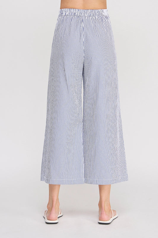 Blue and white striped wide-leg pants on a plain background