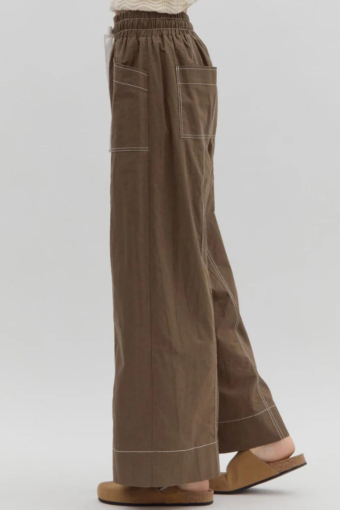 Brown wide-leg pants on a white background