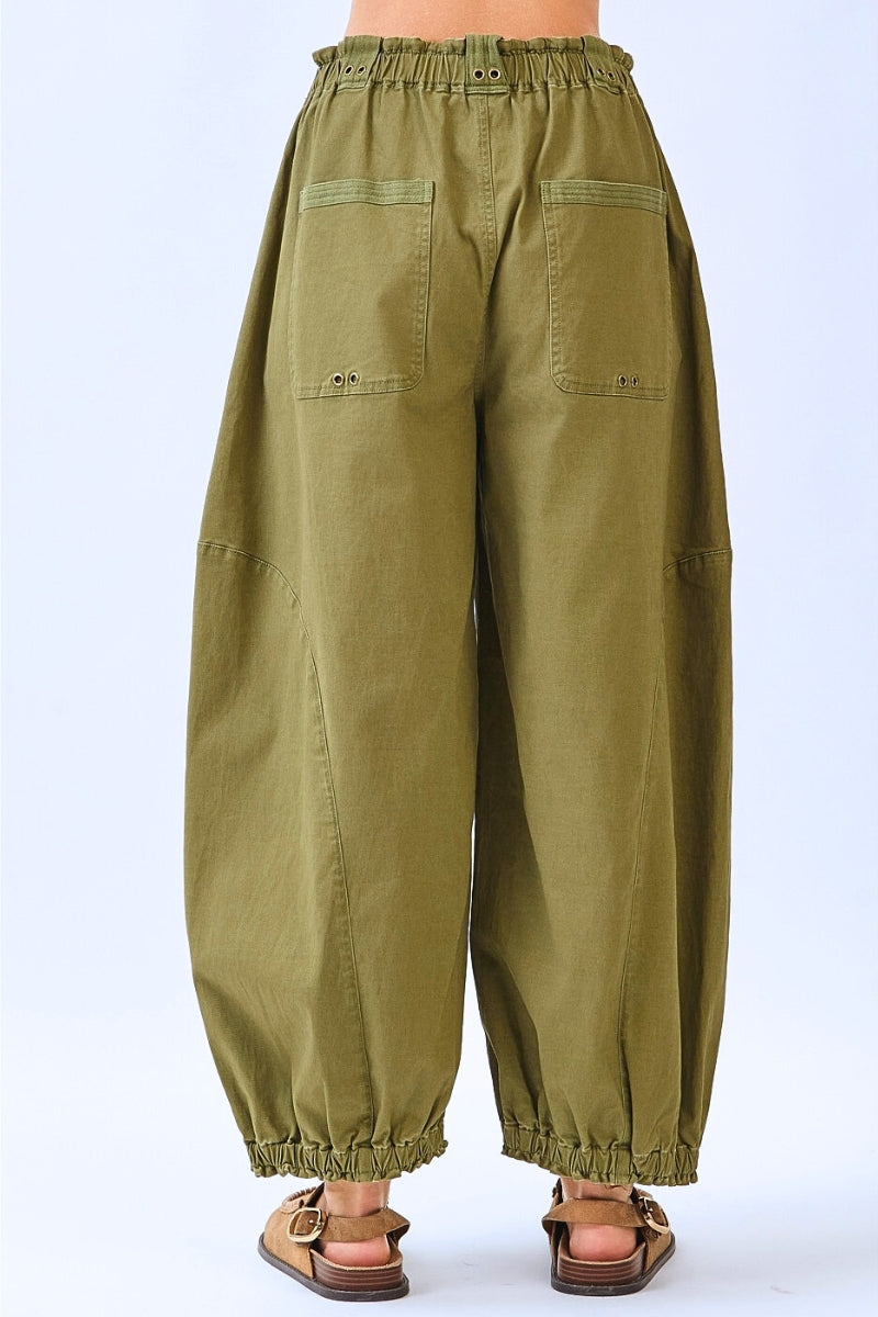 Green baggy pants on a white background