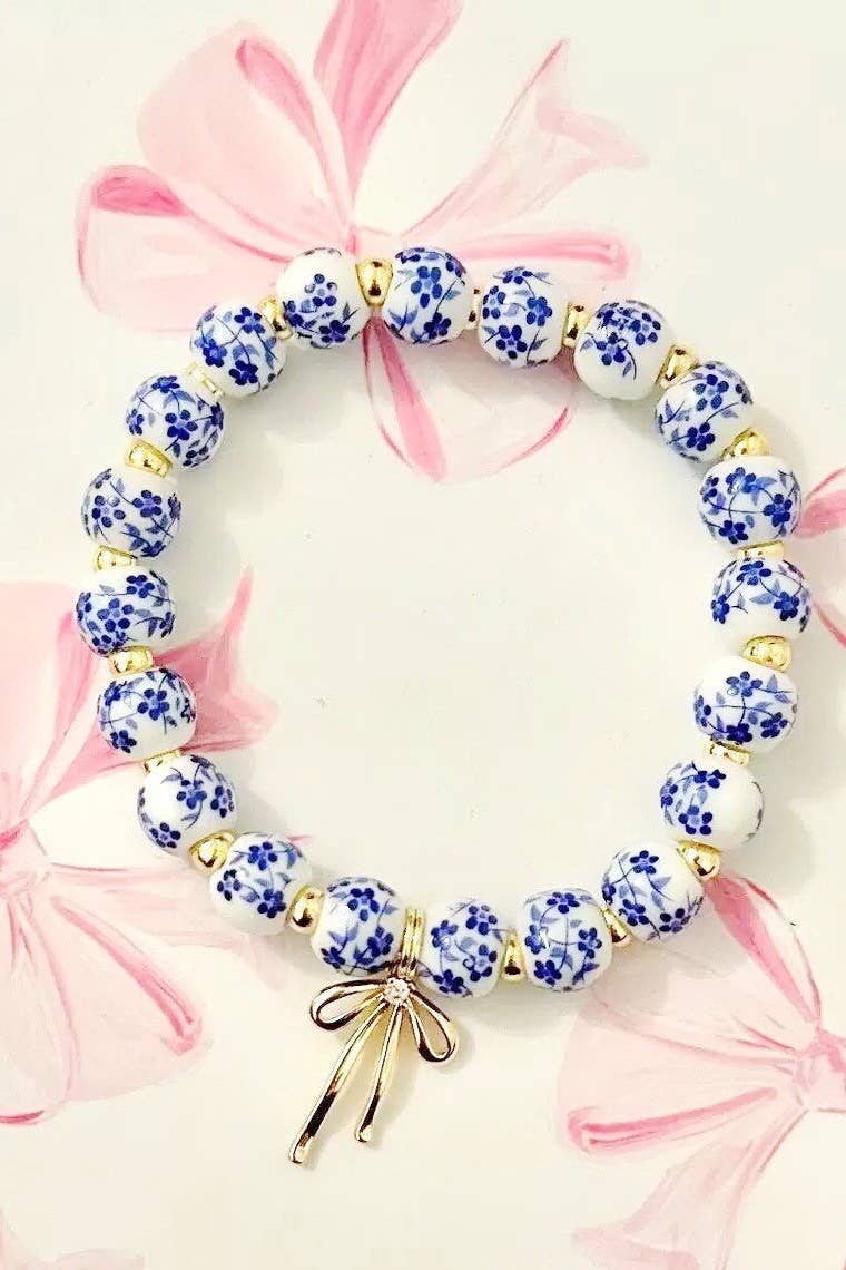 Blue Porcelain Pearls Bow Charm Stretch Bracelet | Uniquely Claudia 