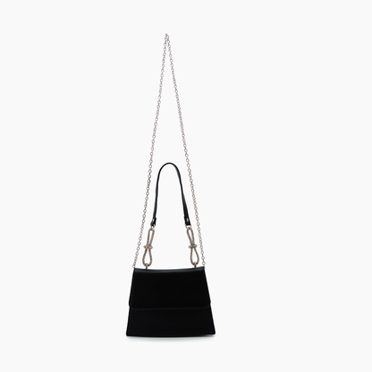 Black handbag with a chain strap on a white background