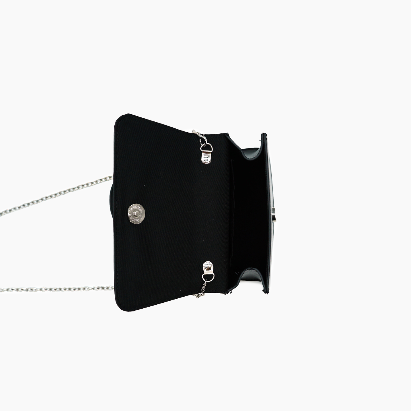 Black handbag with chain strap on a white background