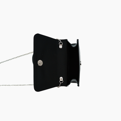 Black handbag with chain strap on a white background