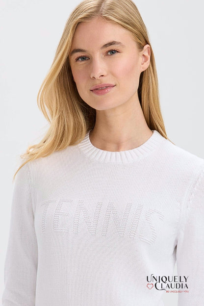 Woman wearing a white sweater 