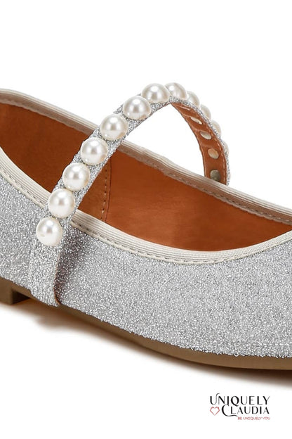 Silver glitter sandal with pearl strap on a white background
