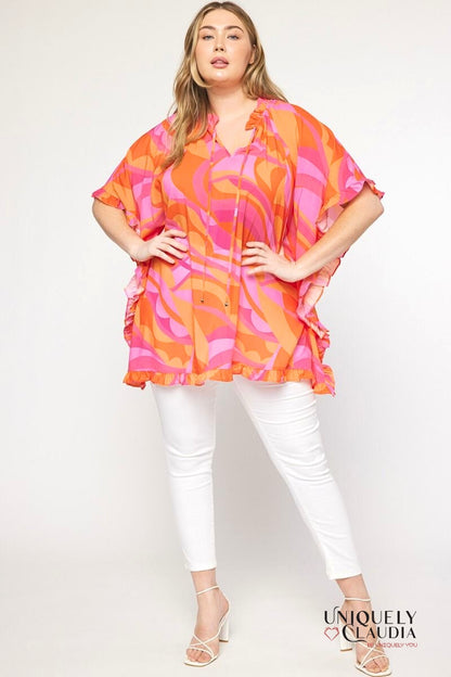 Plus size woman wearing ruffle tunic