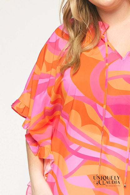 Plus size woman wearing orange tunic