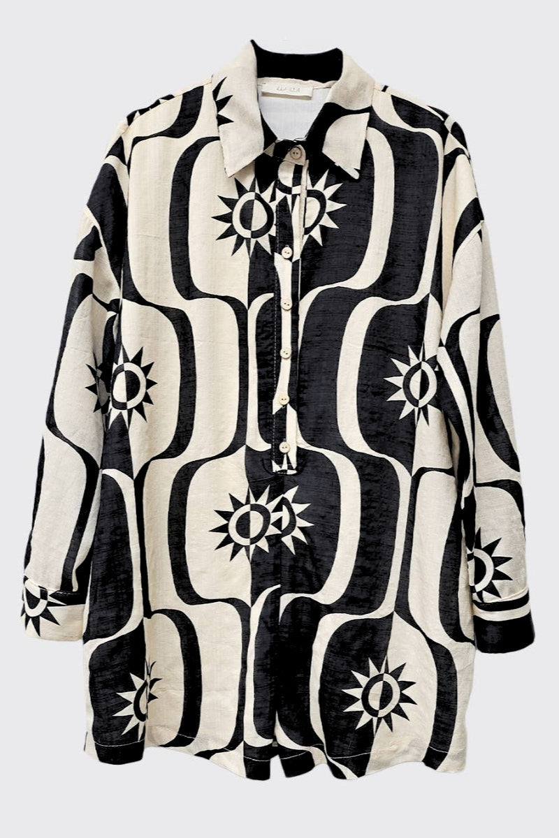 Black and white patterned shirt with star design on a white background