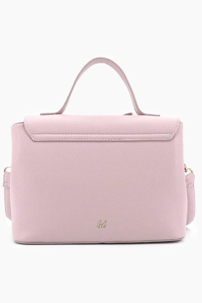 Pink handbag with a visible brand logo on a white background