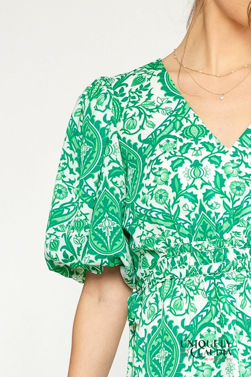 woman wearing green puff sleeve dress