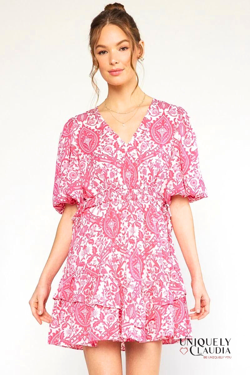 woman wearing pink puff sleeve dress