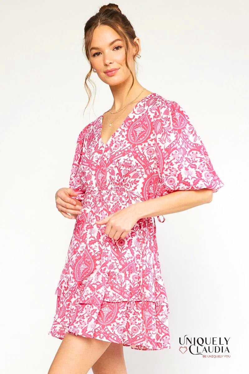 woman wearing pink puff sleeve dress