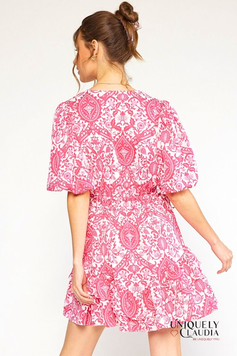 woman wearing pink puff sleeve dress