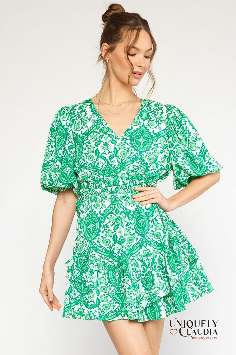 woman wearing green puff sleeve dress