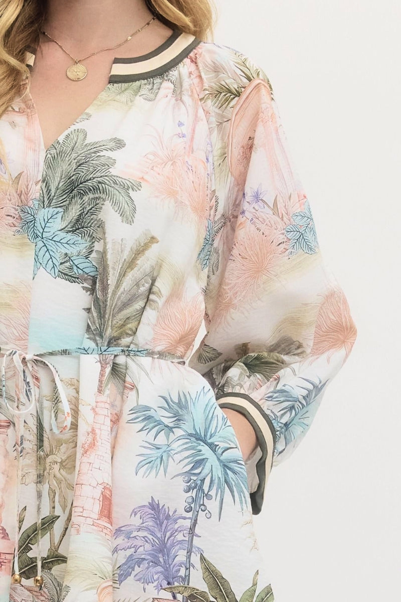 Tropical patterned dress with a white background