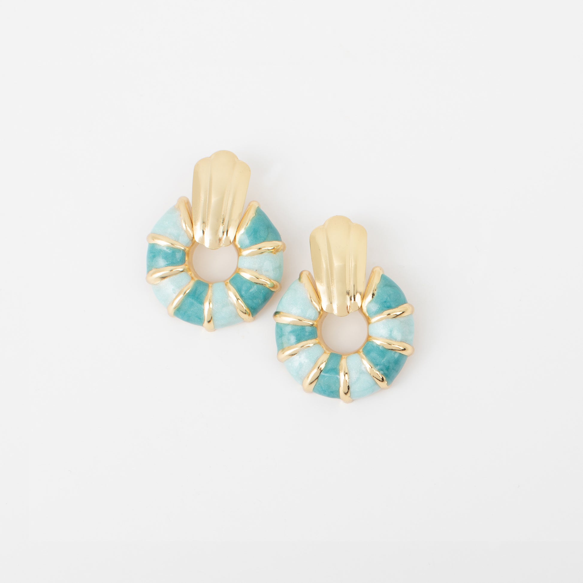 Pair of earrings with turquoise and gold design on a white background