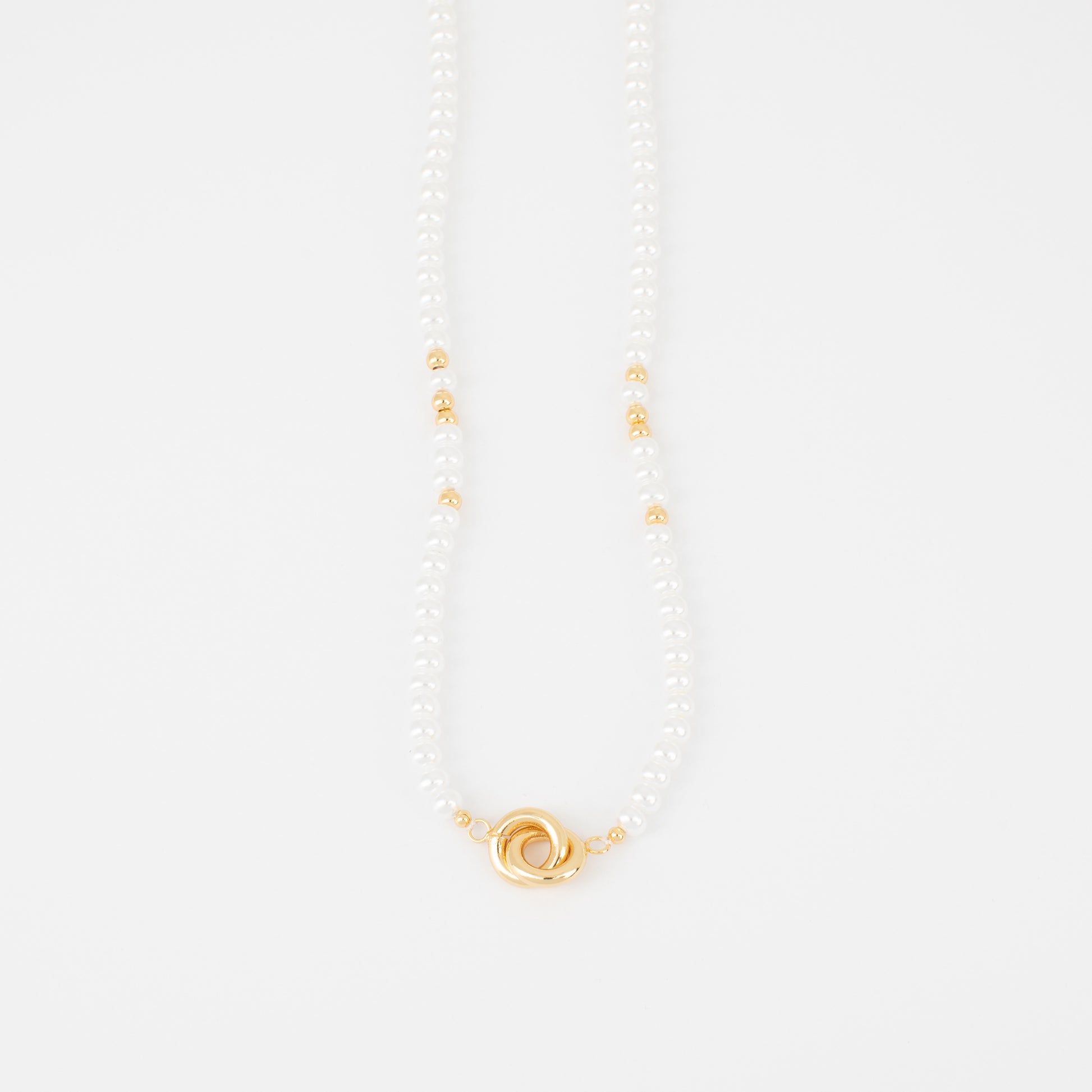 Pearl necklace with a gold clasp on a white background