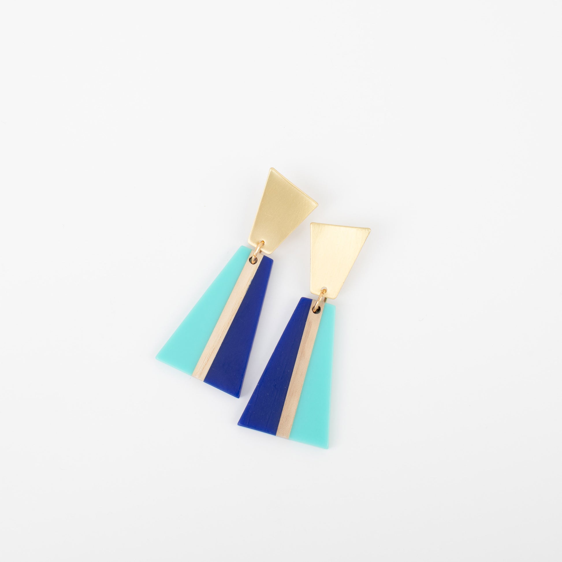 Colorful geometric earrings on a white background