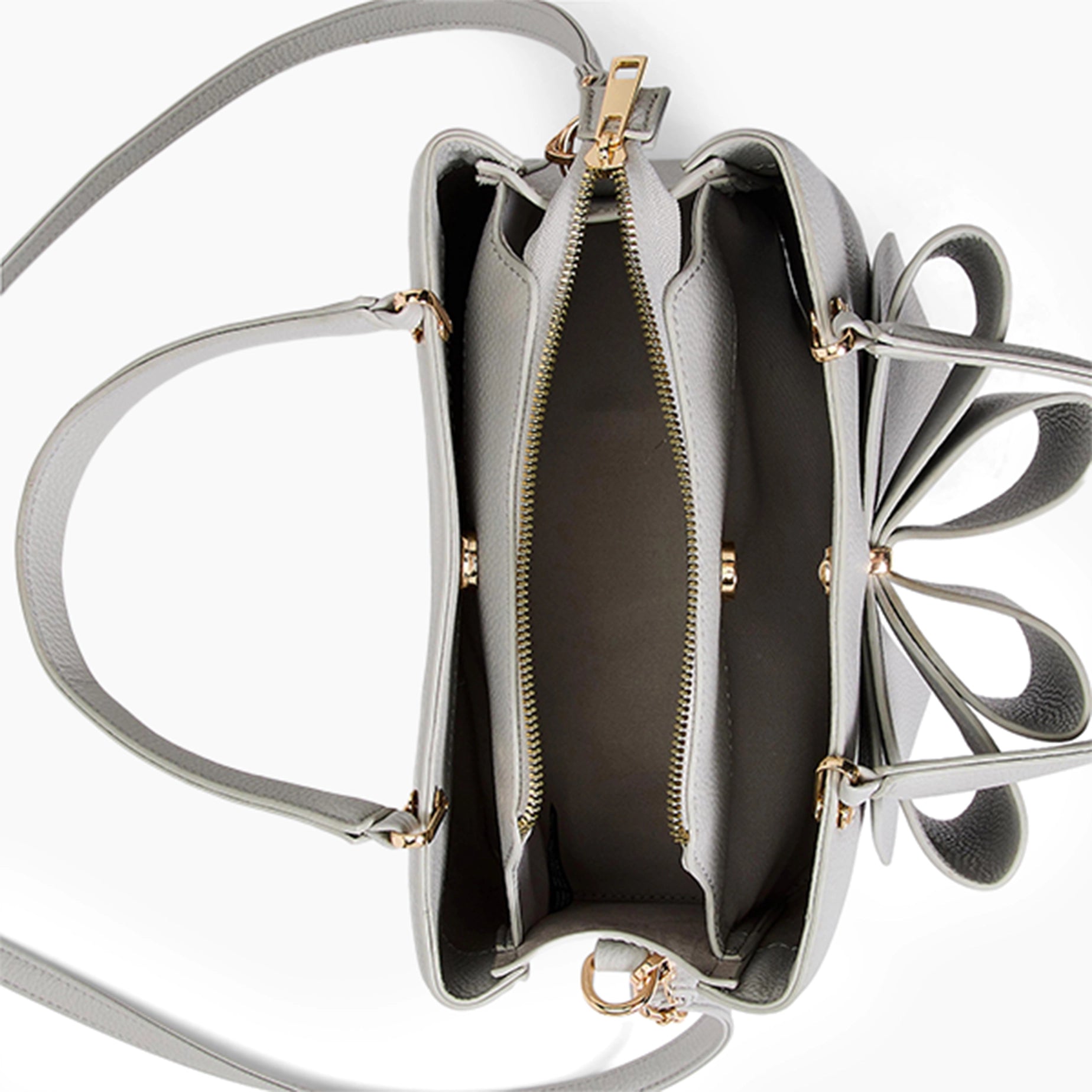 Silver handbag with floral design on a white background
