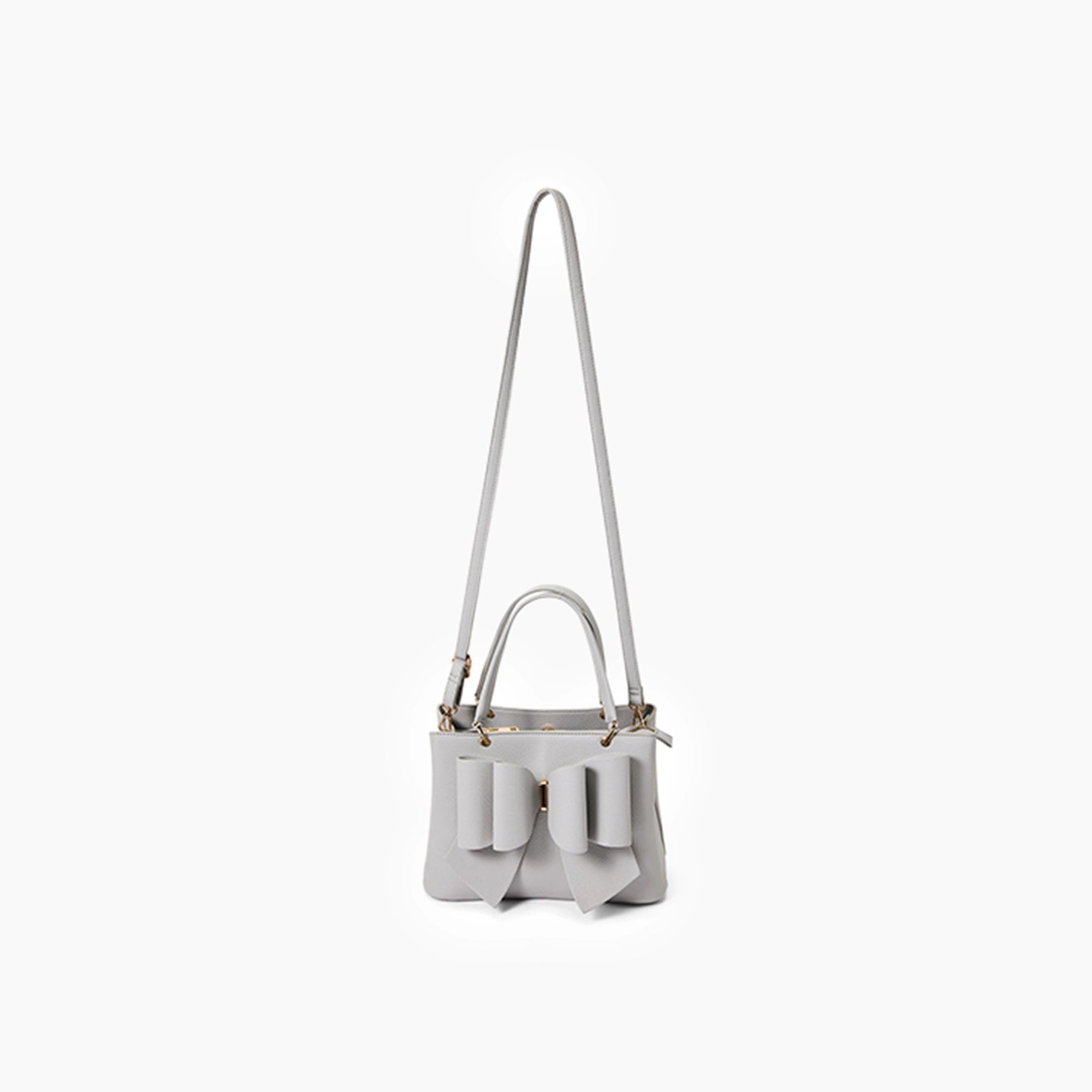 Light gray handbag with a bow detail on a white background