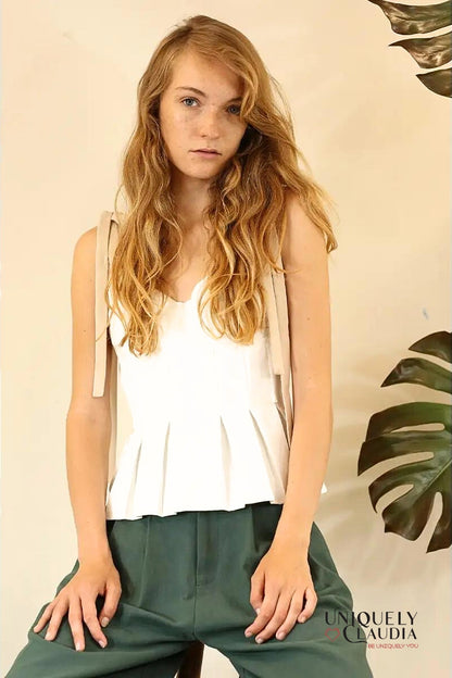 woman wearing straps top
