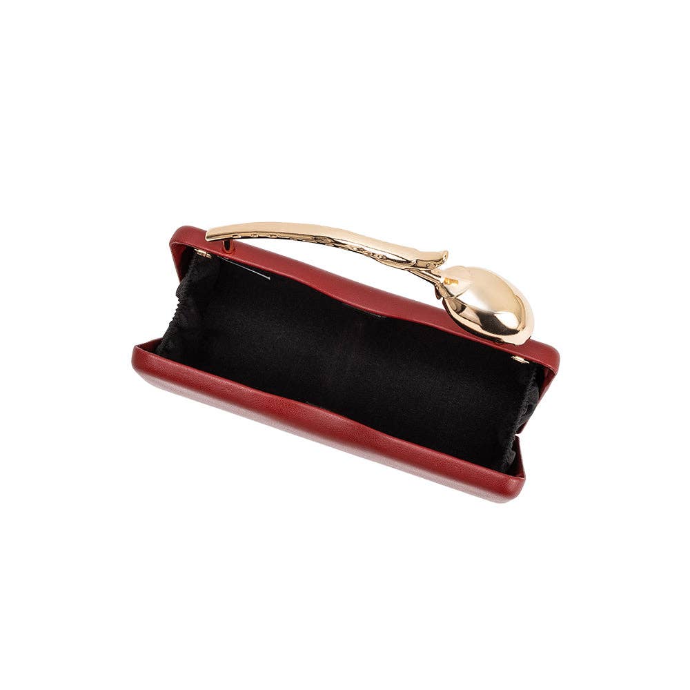 Red clutch bag with gold handle on a white background
