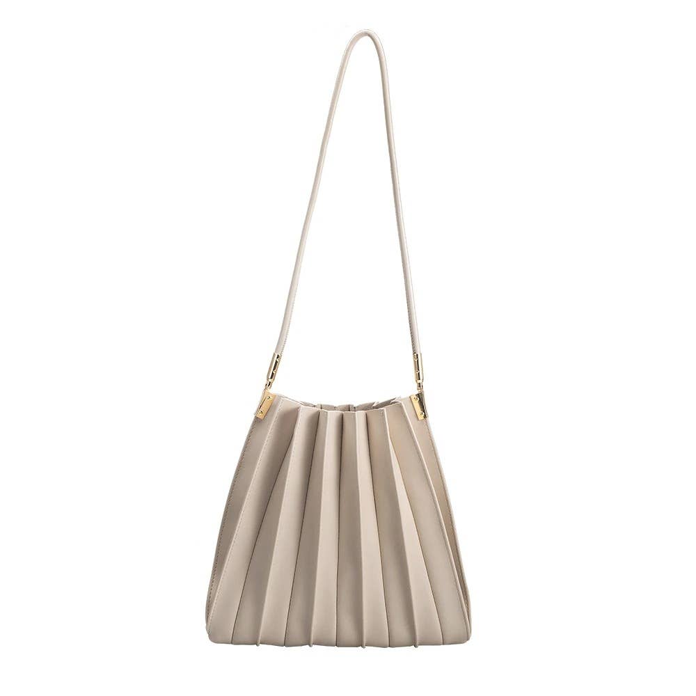 Beige pleated handbag with a strap on a white background