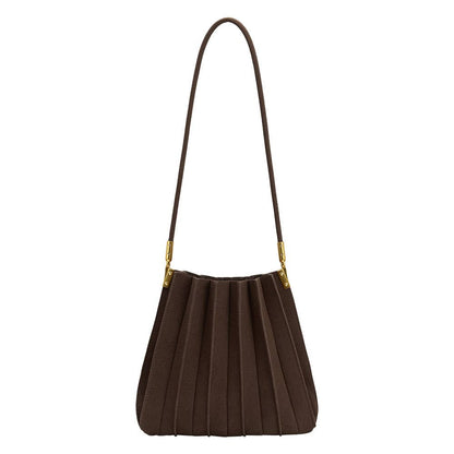 A dark brown pleated shoulder bag with a single strap and gold-tone hardware, shown against a plain white background.