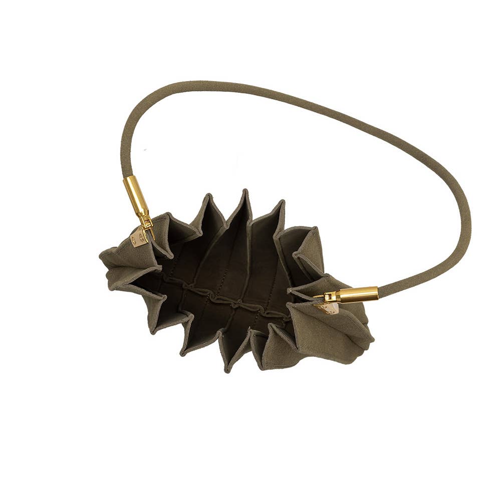 An olive green pleated shoulder bag with a thin matching strap and gold-tone hardware, shown against a plain white background.