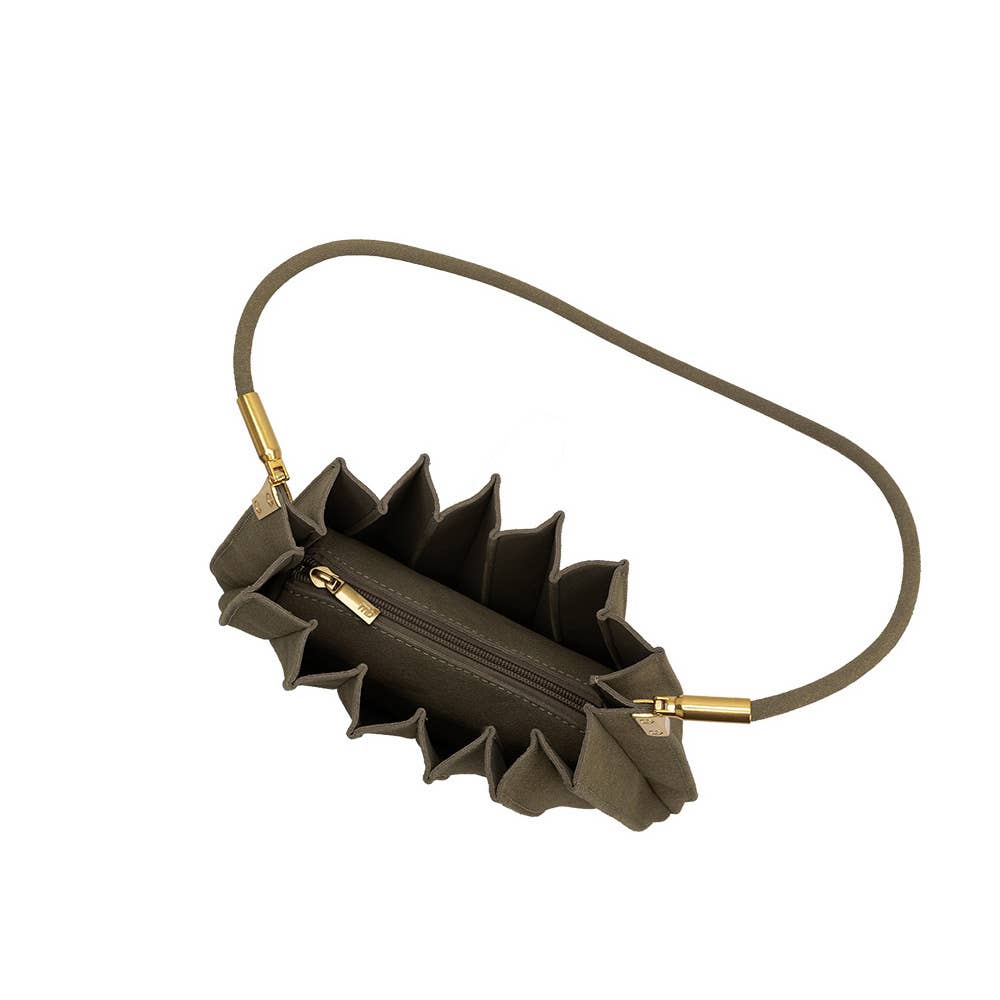 An olive green handbag with a unique pleated, accordion-like exterior and a matching shoulder strap, featuring gold-tone hardware, shown on a plain white background.