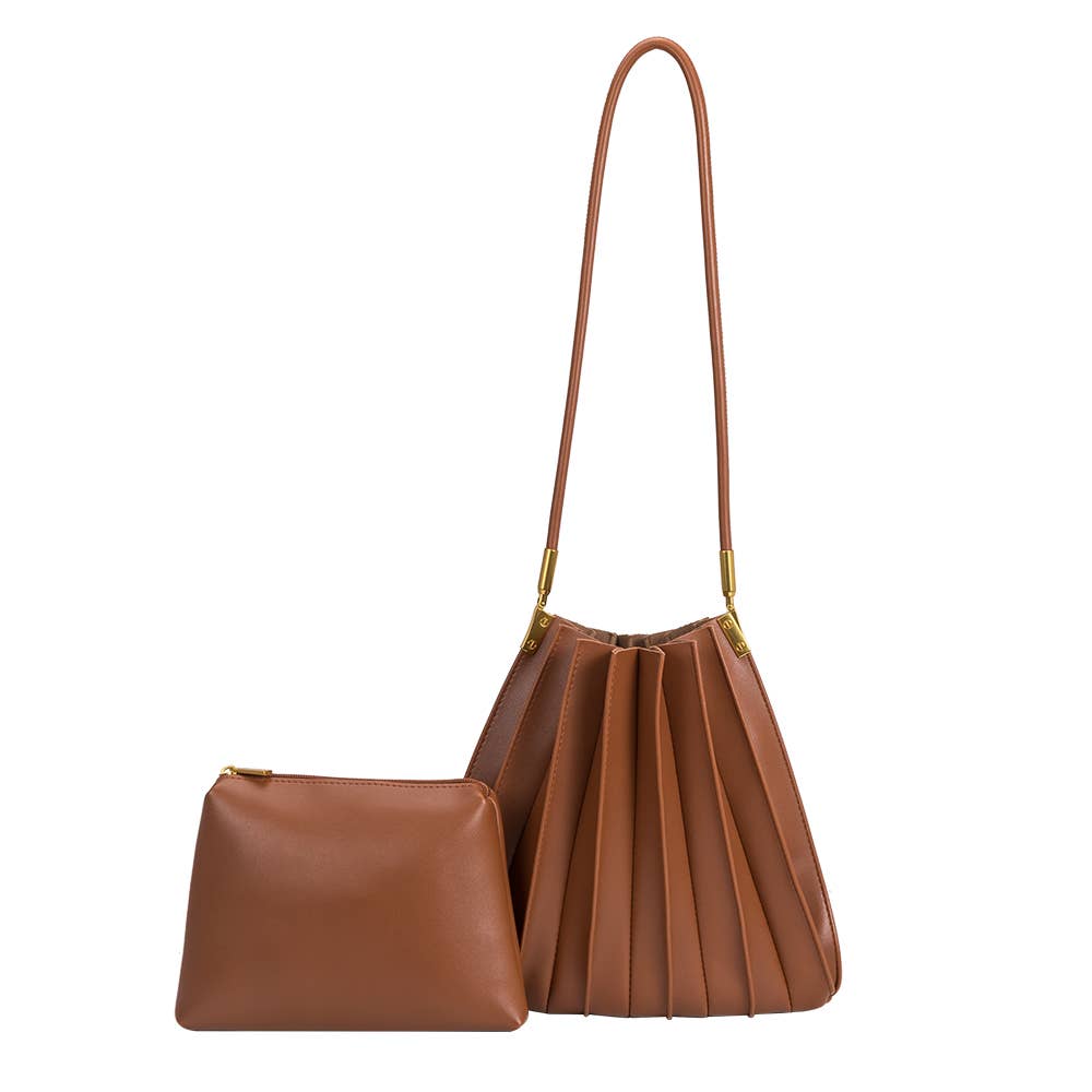 Brown leather handbag with matching pouch on a white background